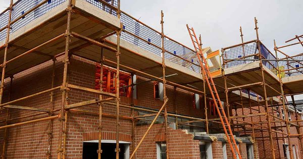 scaffolding-for-house-building-under-theresa-ma.jpg